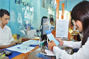 Lãi suất bình quân liên ngân hàng bằng VND giảm ở hầu hết các kỳ ngắn hạn