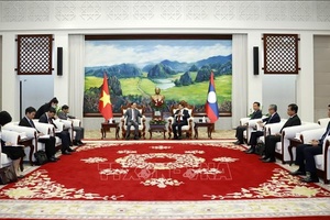Trưởng Ban Đối ngoại Trung ương thăm và làm việc tại Lào