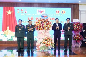 'Kỷ niệm 77 năm Ngày truyền thống quân tình nguyện và chuyên gia quân sự Việt Nam giúp cách mạng Lào